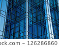 Modern Architecture Office Building Facade featuring Bluetinted Glass Panels and complex Geometric Pattern. Reflective surfaces and Sleek lines accentuate contemporary urban development 126286860