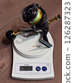 Weigh the reel 126287323