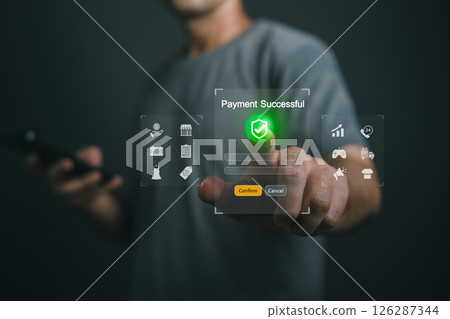Close up Hand Man Using Smartphone to Confirm Payment with Virtual Interface Showing Successful Transaction and Digital Symbols in Modern Environment 126287344