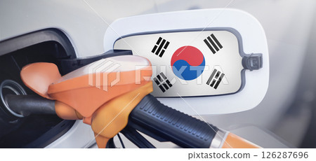 The Korea flag on the lid of the gas tank of a car at a gas station in close-up. High or low gasoline prices at Korean gas stations. Gasoline prices are rising due to a shortage of diesel fuel 126287696