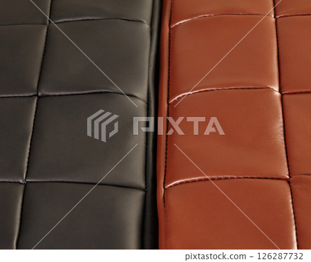 Black and brown leather upholstery creating geometric pattern Black and brown leather upholstery creating geometric pattern 126287732