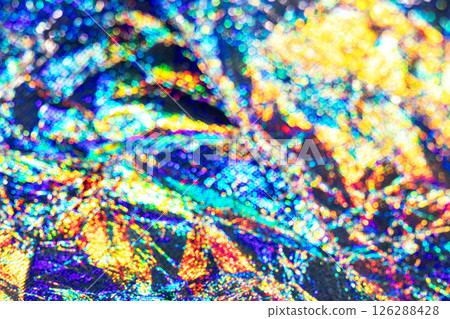 Vivid abstract background with multicolored holographic light bokeh patterns and textures Vivid abstract background with multicolored holographic light bokeh patterns and textures 126288428
