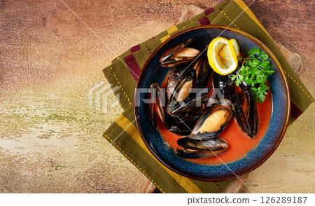 Fra Diavolo mussels, mussels in tomato sauce, Italian dish, on the table, top view, homemade, no people, Fra Diavolo mussels, mussels in tomato sauce, Italian dish, on the table, top view, homemade, no people, 126289187