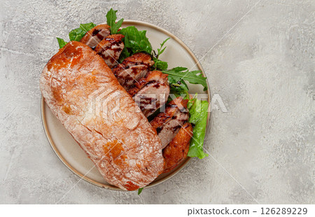 sandwich with duck breast and arugula, balsamic sauce, on a light plate, breakfast, homemade, no people, 126289229