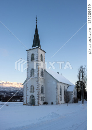 White church and country with snow, Ibestad, Norway White church and country with snow, Ibestad, Norway 126289459