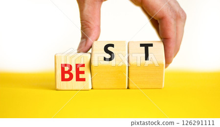 Motivational and inspirational be best symbol. Concept words Be best on beautiful wooden block. Beautiful white background Businessman hand. Business motivational be best concept. Copy space. 126291111