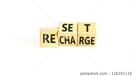 Reset and recharge symbol. Concept words Reset Recharge on beautiful wooden block. Beautiful white table white background. Business reset and recharge concept. Copy space. 126291116