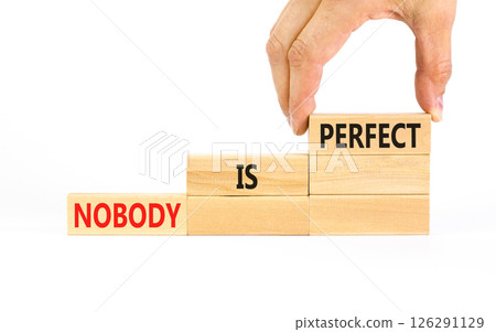 Nobody is perfect symbol. Concept words Nobody is perfect on beautiful wooden block. Beautiful white background. Business motivational lifestyle and nobody is perfect concept. Copy space. Nobody is perfect symbol. Concept words Nobody is perfect on beautiful wooden block. Beautiful white background. Business motivational lifestyle and nobody is perfect concept. Copy space. 126291129
