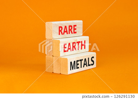 Rare earth metals symbol. Concept words Rare earth metals on beautiful wooden block. Beautiful orange table orange background. Business and rare earth metals concept. Copy space. Rare earth metals symbol. Concept words Rare earth metals on beautiful wooden block. Beautiful orange table orange background. Business and rare earth metals concept. Copy space. 126291130
