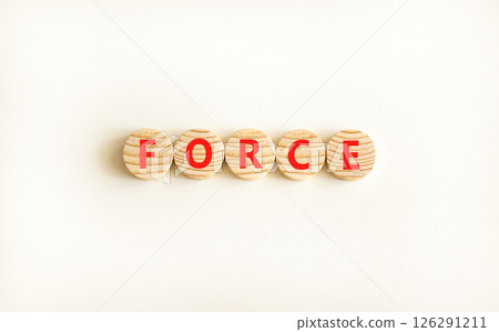 Force symbol. Concept word Force on beautiful wooden circles. Beautiful white table white background. Business lifestyle force concept. Copy space. 126291211