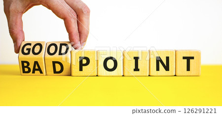 Good or bad point symbol. Concept words Good point Bad point on beautiful wooden blocks. Beautiful yellow table white background. Businessman hand. Business good bad point concept. Copy space 126291221