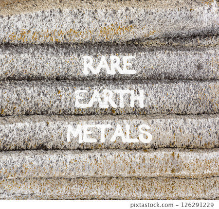 Rare earth metals symbol. Concept words Rare earth metals on beautiful grey stone wall. Beautiful grey mountain stone wall background. Business and rare earth metals concept. Copy space. Rare earth metals symbol. Concept words Rare earth metals on beautiful grey stone wall. Beautiful grey mountain stone wall background. Business and rare earth metals concept. Copy space. 126291229