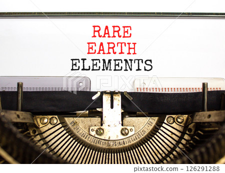 Rare earth elements symbol. Concept words Rare earth elements typed on beautiful old retro typewriter. Beautiful white paper background. Business and rare earth elements concept. Copy space. 126291288