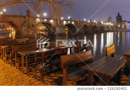 Charles Bridge at night in Prague, Czech Republic 126292402