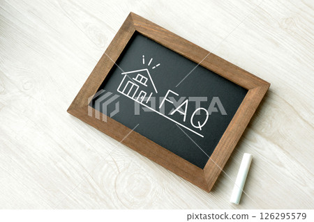 A blackboard frame with an illustration of FAQs about home ownership 126295579