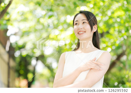 A woman relaxing in the park 126295592