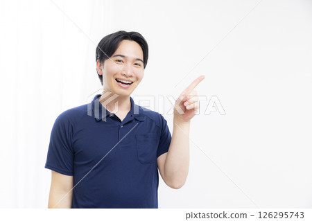 Men in polo shirts that make a guts pose Men in polo shirts that make a guts pose 126295743
