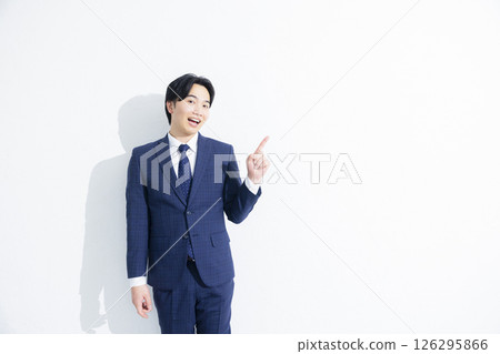 A pointing businessman 126295866