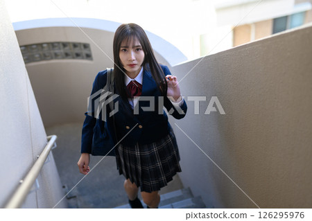 High school girl climbing stairs, high school student, blazer High school girl climbing stairs, high school student, blazer 126295976