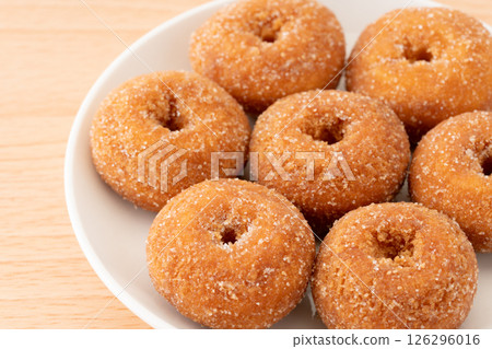 Delicious mini donuts on a plate 126296016