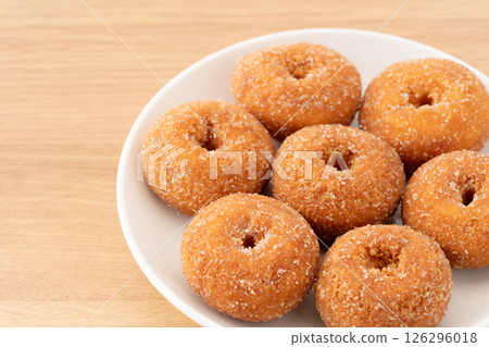 Delicious mini donuts on a plate Delicious mini donuts on a plate 126296018