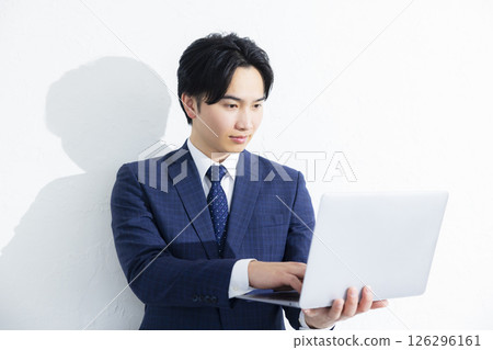 Businessman using a personal computer 126296161