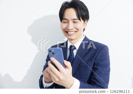 Businessmen using smartphones 126296211