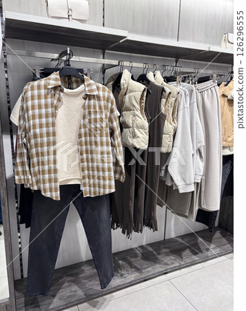 Fashionable women's clothing collection. Modern retail store Fashionable women's clothing collection. Modern retail store 126296555