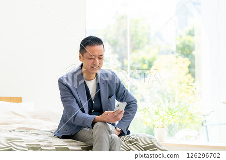 Senior male smartphone 126296702