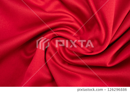 Full frame shot of wrinkled red polyester cloth texture and background. 126296886