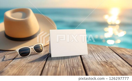 An incredibly Relaxing Beach Scene showcasing Stylish Sunglasses and a Comfortable Sun Hat 126297777