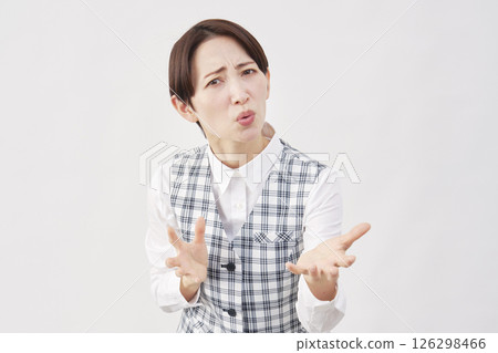 Female office worker suing on white background Female office worker suing on white background 126298466