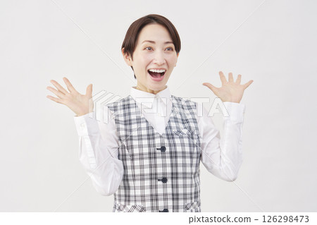 Female office worker, smiling and surprised, white background, facing right Female office worker, smiling and surprised, white background, facing right 126298473