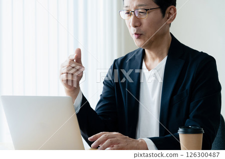 Men having an online meeting 126300487