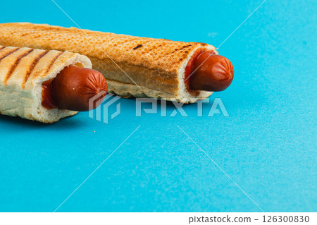 Unique hot dog presentation with waffle bread rolls 126300830
