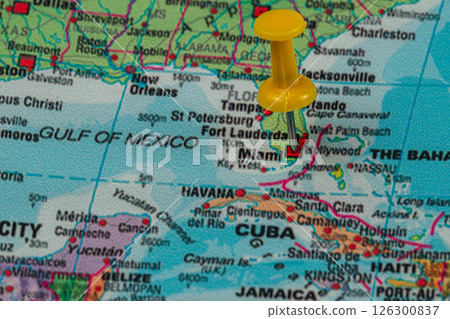 Bright yellow pushpin marks Miami on a detailed map of Florida 126300837