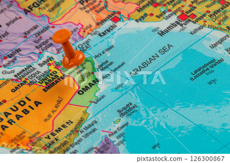 Pinpointing Oman on a vibrant world map in detail Pinpointing Oman on a vibrant world map in detail 126300867