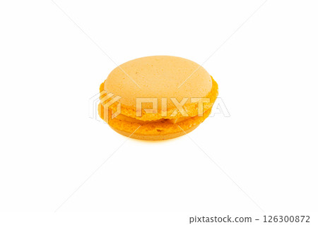 Delightful orange macaron on a white background 126300872