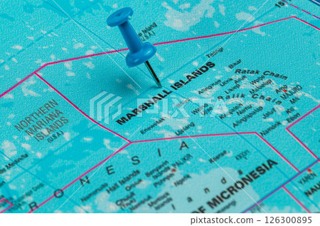 Detailed map of the Marshall Islands with a blue pushpin mark 126300895