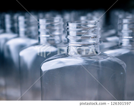 Row of plastic PET Bottles Production Line - Ready for Bottling. Row of plastic PET Bottles Production Line - Ready for Bottling. 126301597