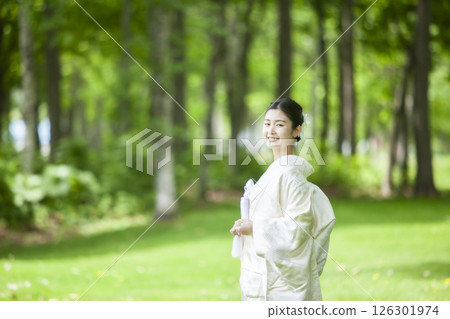 Bride wearing white dress 126301974