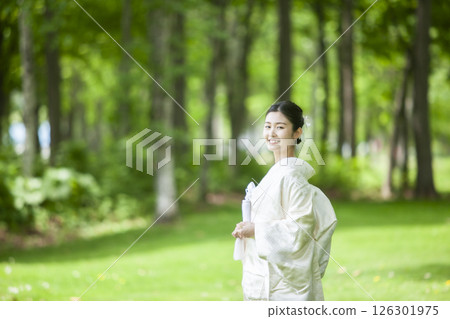 Bride wearing white dress 126301975