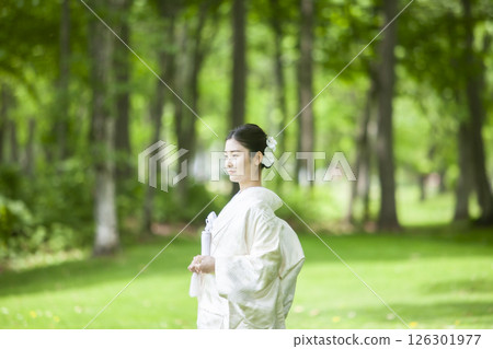 Bride wearing white dress 126301977