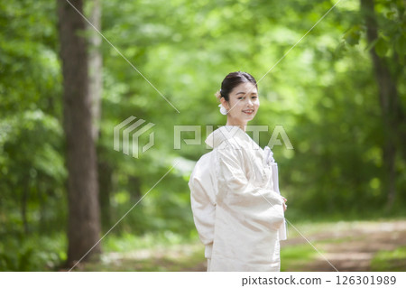Bride wearing white dress 126301989