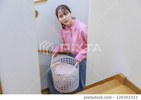 Woman tired of housework Woman tired of housework 126302333