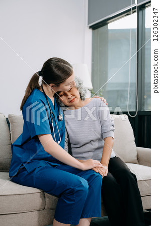 female hands touching senior male hand Helping hands take care of the elderly concept 126302347