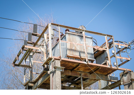 Electrical Transformer Station with Power Lines and Insulators in Industrial Setting 126302616