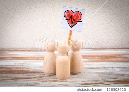 Wooden Figures Holding Heartbeat Sign Representing Health Awareness or Advocacy 126302620