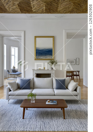 Modern living room design featuring elegant furniture and minimalist decor in a bright space 126302908