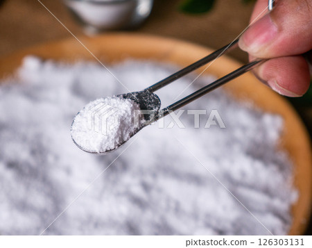 Isomalt or Maltitol sugar alcohol used as a sugar substitute and laxative. 126303131
